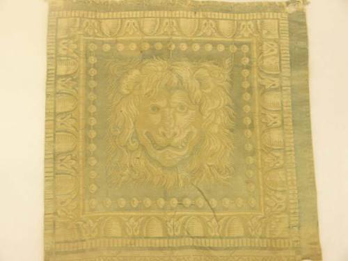 Textile with face of lion