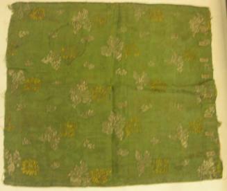 Green brocade with yellow and white flowers, with button holes