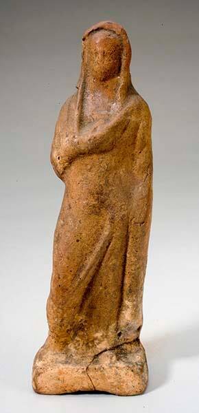 Tanagra figurine of a standing draped woman