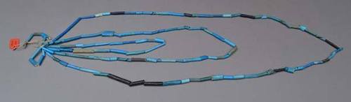 Blue beads strung together as a necklace