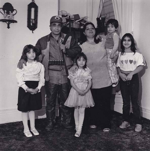 Mother, father and child in front of Christmas tree (with four kids), from the series "Lower West Side"