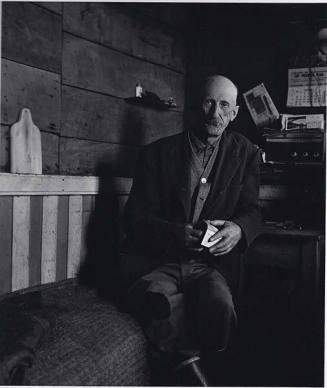 Bald man sitting on bench, from the series "Chile"