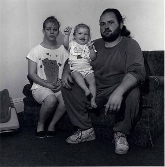 Heavy set couple with child on sofa, from the series "Children of Child"