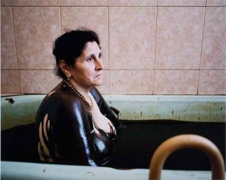 Woman Bathing in Crude Oil (Gold Necklace), Naftalan, Azerbaijan, from the series "Caspian: the Elements"