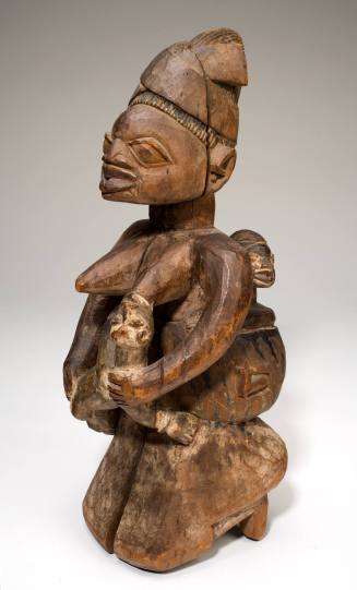 Shrine figure of a mother and two children