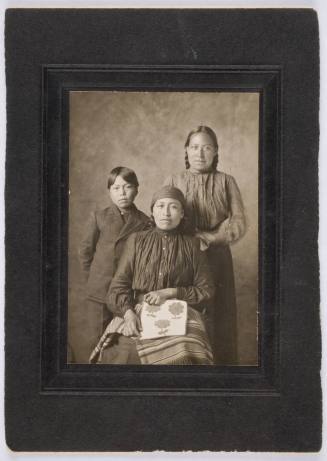 Two Unidentified Women and Child