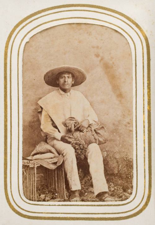 Vendedor de Pirú [seated man with sombrero selling pirú], from the album "Mexican Occupationals"