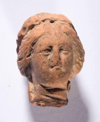 Tanagra figurine head