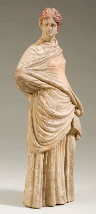 Tanagra figurine of a standing woman