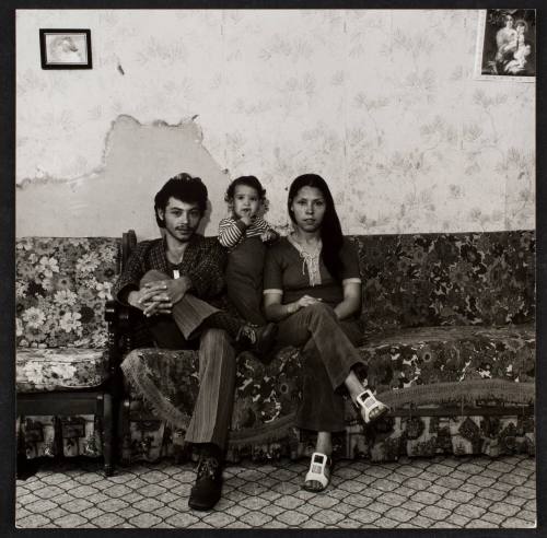 Couple and child on couch, from the series "Lower West Side"