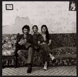 Couple and child on couch, from the series "Lower West Side"