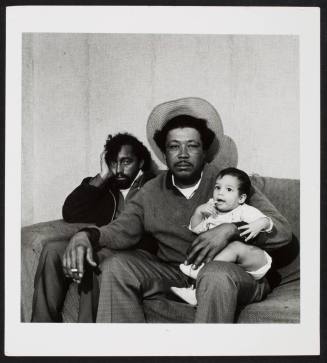 Two men and a baby, from the series "Lower West Side"