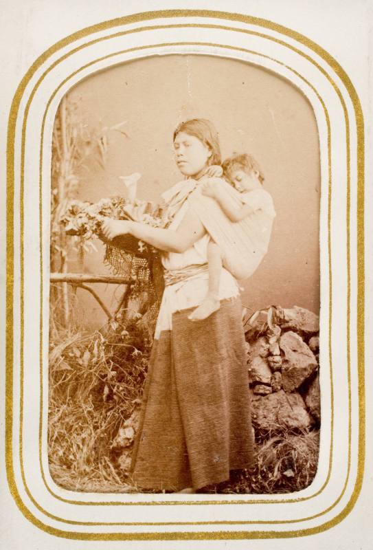 Vendedora de Flores [young woman carrying child on back selling flowers in a basket], from the album "Mexican Occupationals"