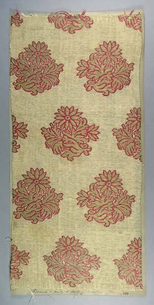 Brocade, floral pattern outlined in red on cream