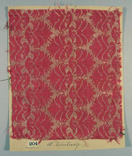 Red and silver brocade, flamelike palmettes, small