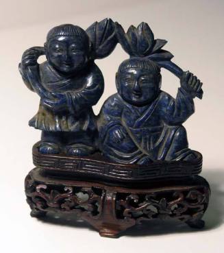 Two Boys Holding Lotus Blossoms
