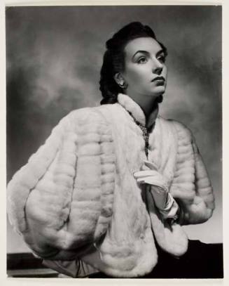 Woman in ermine jacket