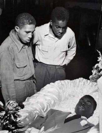 Red Jackson and Herbie Levy Study Wounds on Face of Slain Gang Member Maurice Gaines