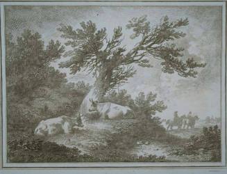 Two cows under a tree