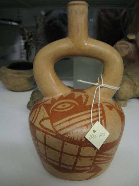 Stirrup-Spout with Anthropomorphic Animals