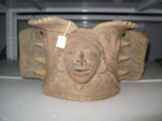 Vessel with face and hands