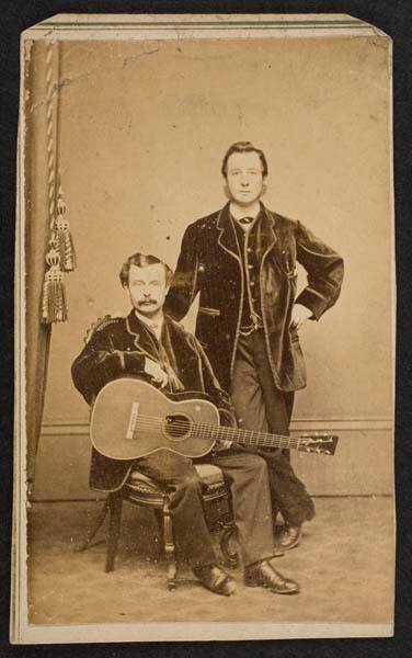 Two Men With Guitar